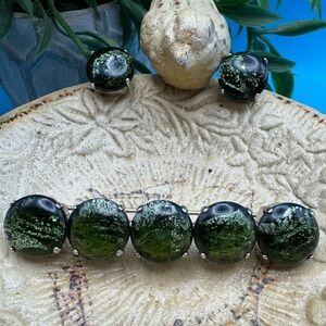 Vintage green dichroic glass brooch & clip earrings, EUC. Silver tone.